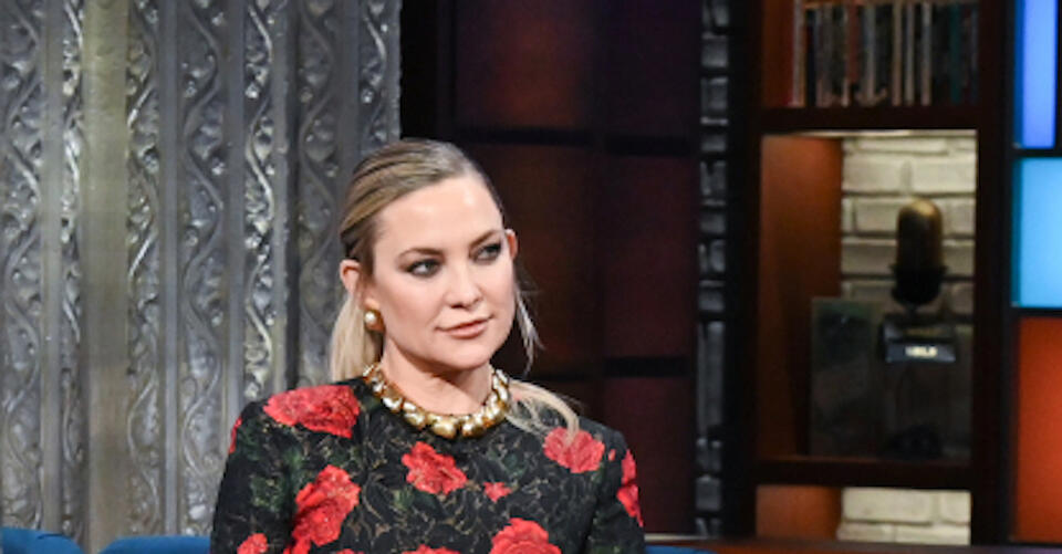 Kate Hudson Smells the Roses With Brother Oliver in Floral Mini Dress and Sandals for ‘Stephen Colbert’ – NewsBreak