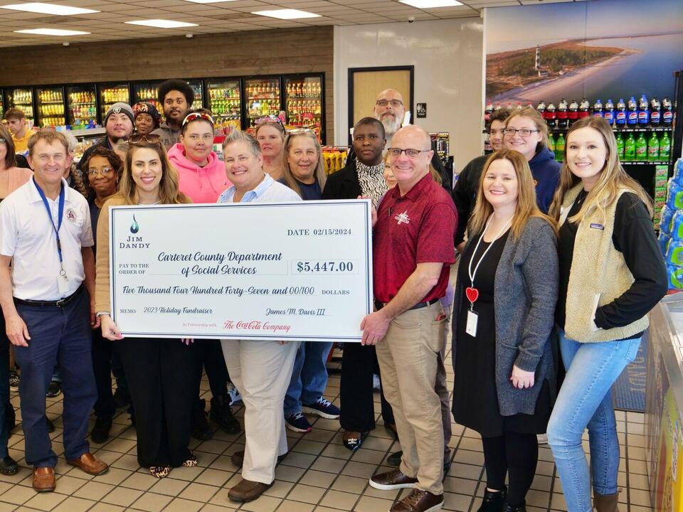 Jim Dandy, CocaCola donate funds to help DSS support foster care programs