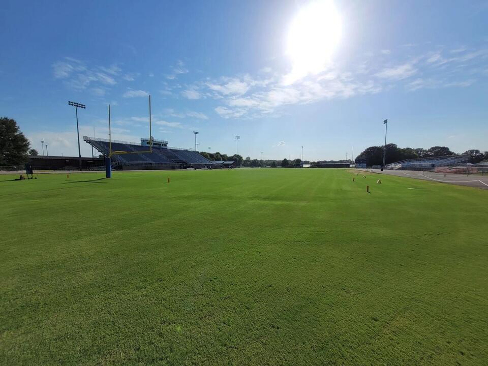 High school football teams manage intense heat before season