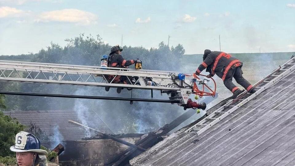 Crews respond to barn fire that started due to controlled burn nearby