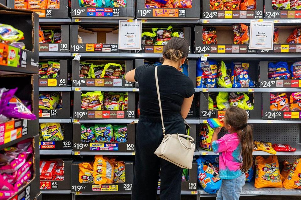 People shopping for Halloween costumes and decorations