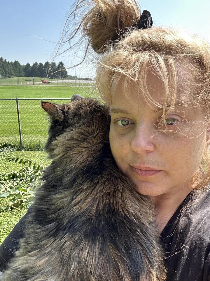 My Cats Help Me Cope with Chronic Pain - NewsBreak
