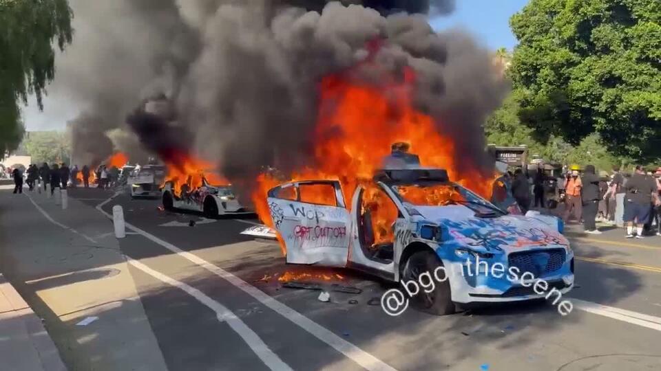 Waymo self driving cars in LA. Why you ask? Rage against the machine ...