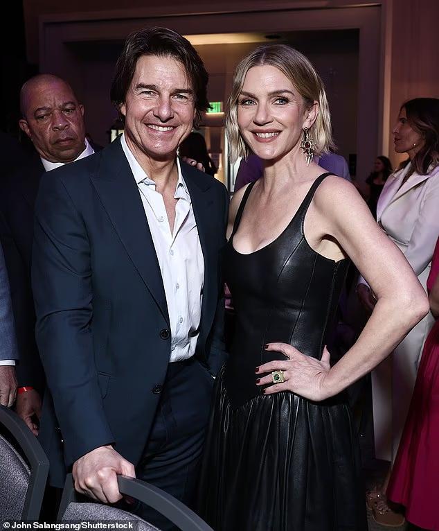 Tom Cruise enjoys rare award show appearance as he poses with Elle ...