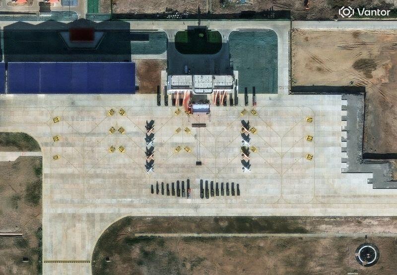 Exclusive-Attack aircraft, military vehicles visible at new China-Laos ...