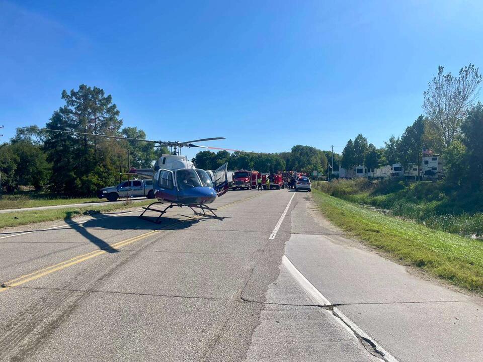 Driver airlifted to hospital after car, semi crash - NewsBreak