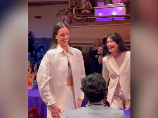 Caitlin Clark hilariously hugs Jake from State Farm before her parents