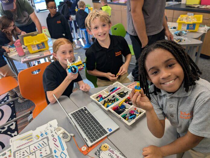 Mercerians teach coding skills to Roberts Academy students - NewsBreak