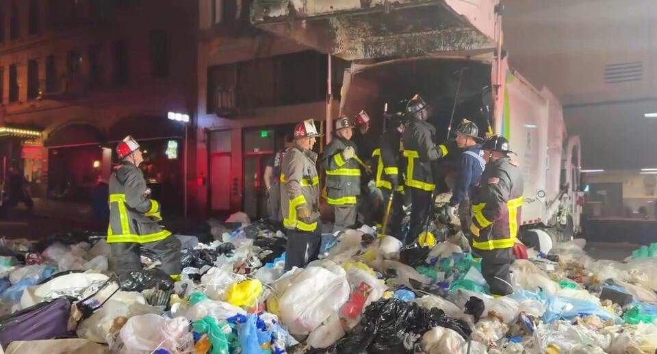 Firefighters rescue person trapped inside garbage truck in Union Square