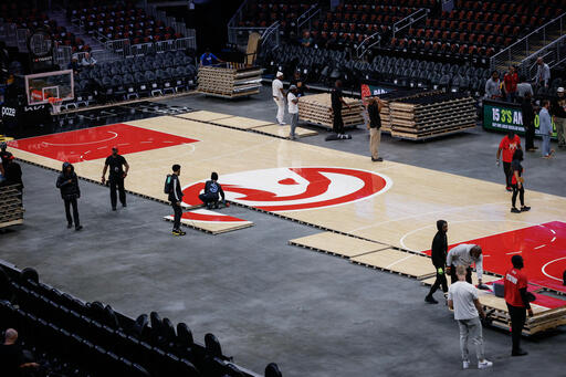 State Farm Arena workers change Dream's WNBA Finals court in time for ...