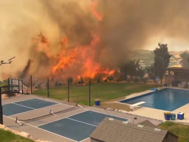 Evacuations lifted after wildfire threatens Washington Terrace homes
