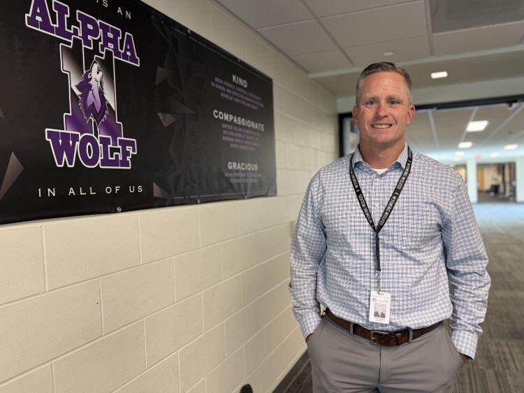 High school principal expands role