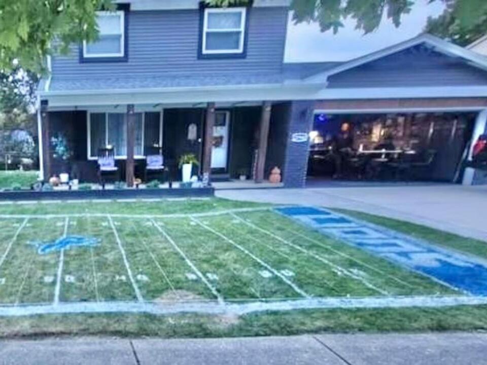 Diehard Detroit Lions fan turns front lawn into Ford Field scale replica