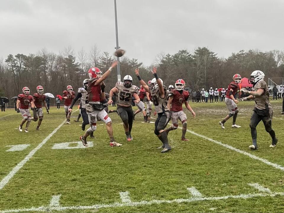 Under sheets of rain, Old Rochester football season comes to close