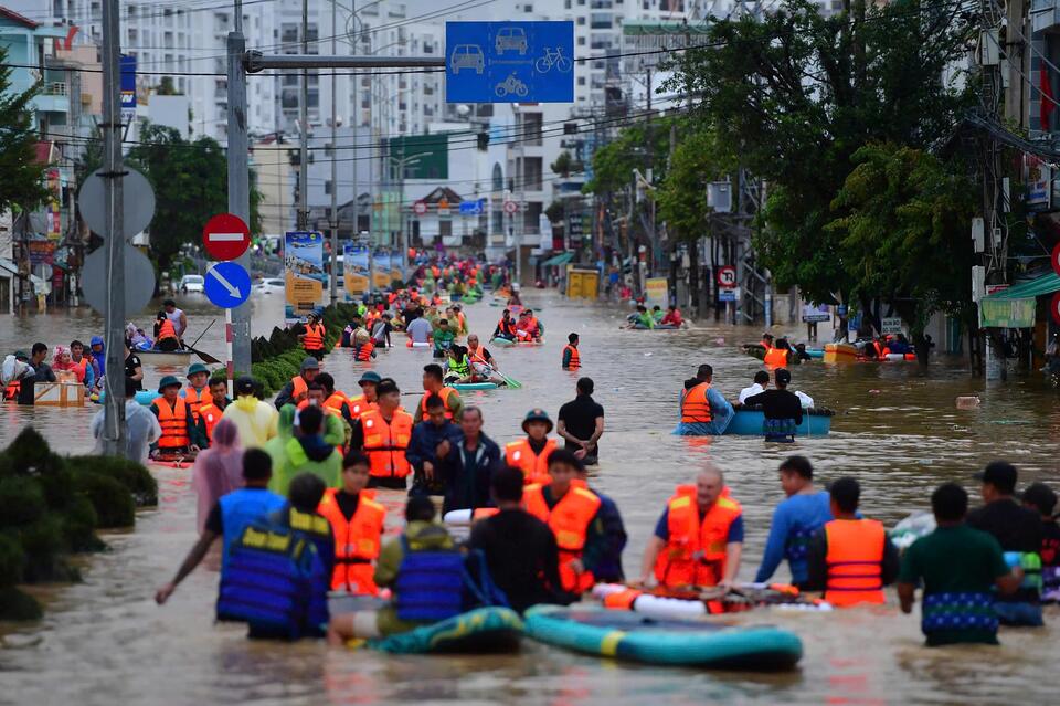 Vietnam floods leave at least 90 dead as record rains trigger ...