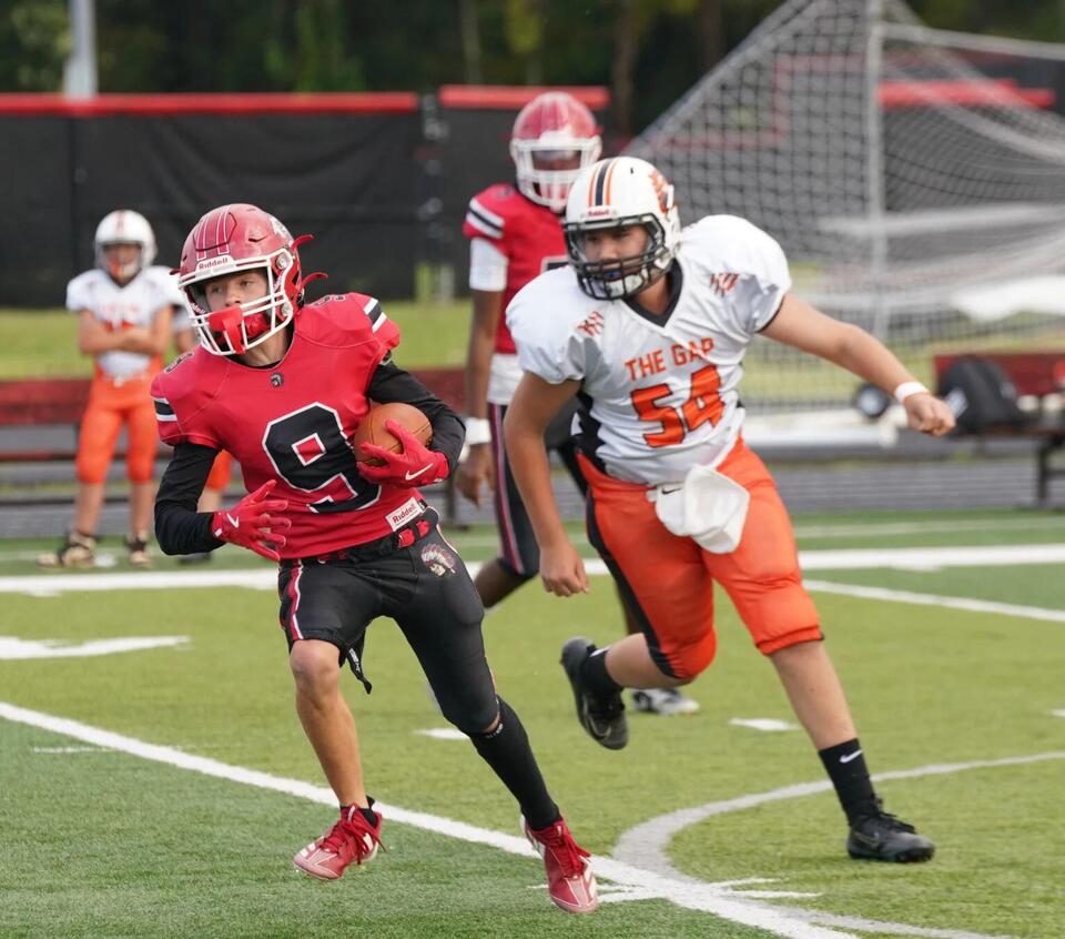 PHOTO GALLERY: RCS Warriors dominate Bulldogs - NewsBreak