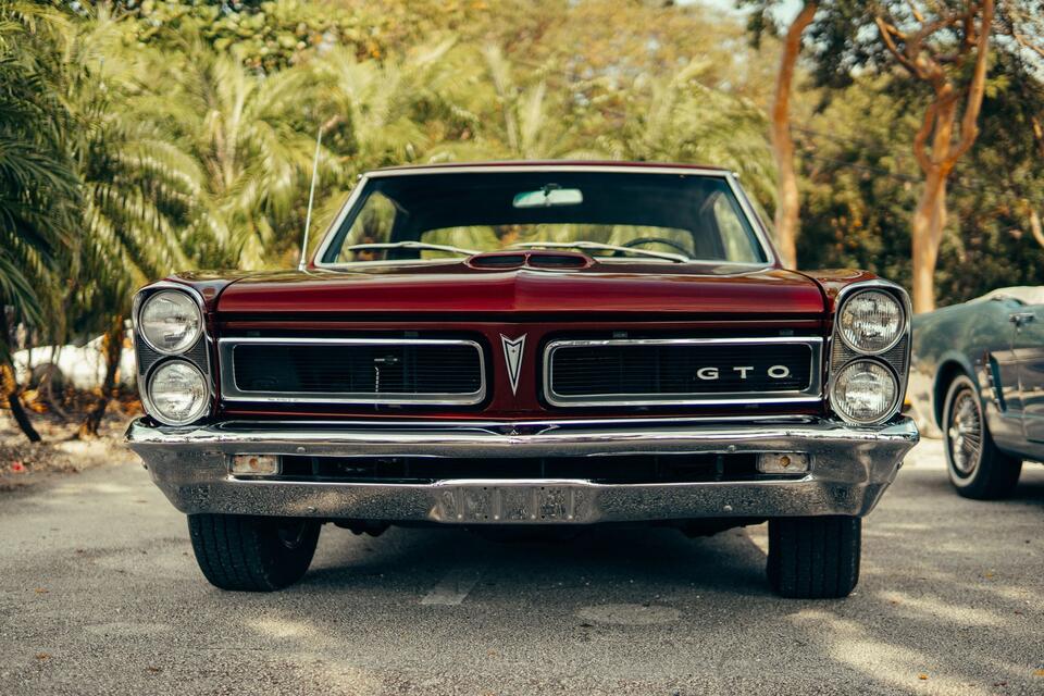 Restorer pulls a vintage Pontiac GTO body out of a chemical acid tank ...