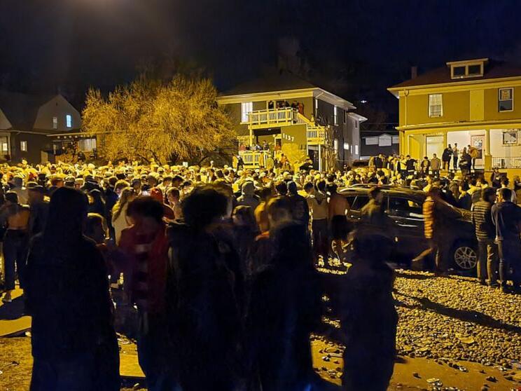 Hundreds of rowdy revelers throw out-of-control street ...