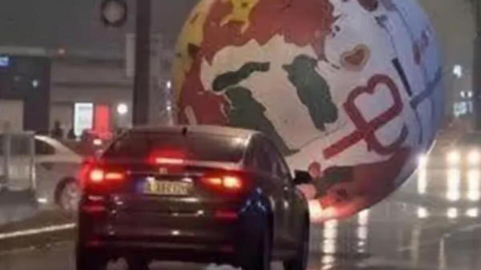 Giant runaway World Cup ball turns streets into real-life Rocket League ...
