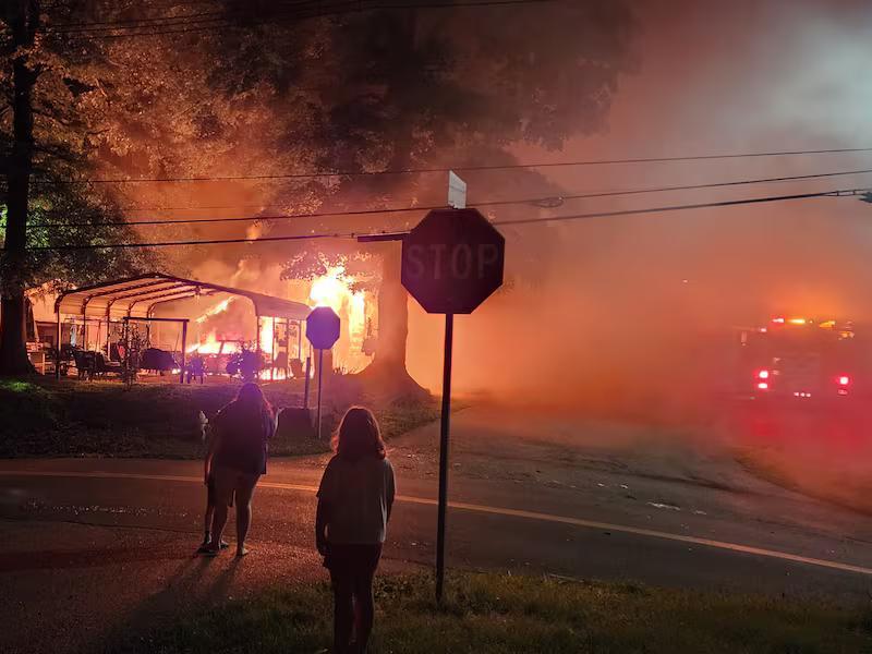 Coroner names woman killed in Henderson Co. fire