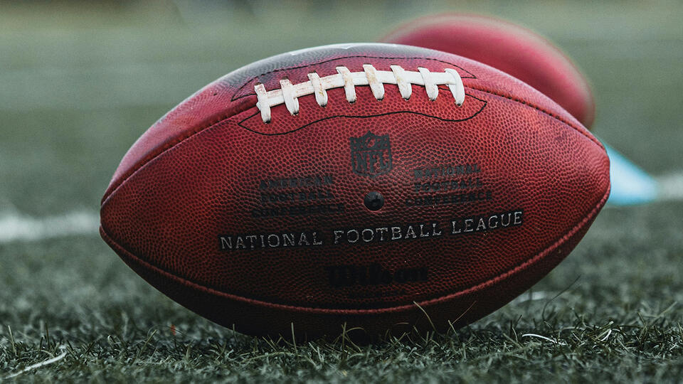 What Size Is a Football? High School, College, and NFL Dimensions ...