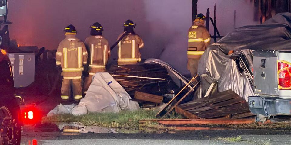 Woodworking shop fire shuts down Fussell Road at Veterinary Way in Lee County