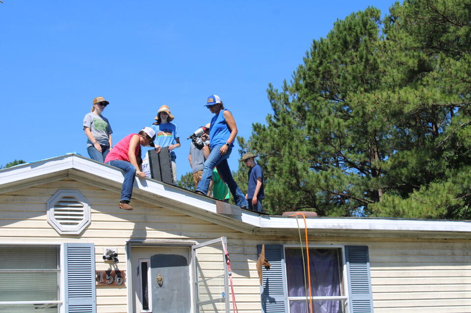 Servants on Site volunteers demonstrate their love for the Lord by helping others