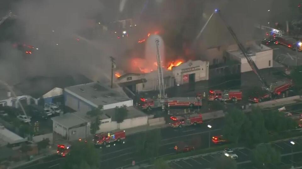 Newhall auto body shop fire spreads to restaurant, theater and other businesses