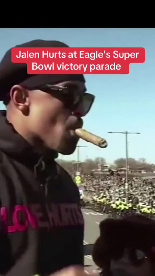 Philadelphia Eagles Quarterback Jalen Hurts smoked a cigar at the team s  Super Bowl victory parade. His fianc Bry Burrows celebrated with him on the  team float. 93150 #Scoopz #LifeDrama #FavMovieClip #CaughtOnCamera -