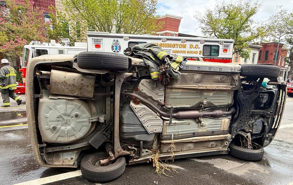 PHOTOS: Car crash sends man to hospital in DC - NewsBreak