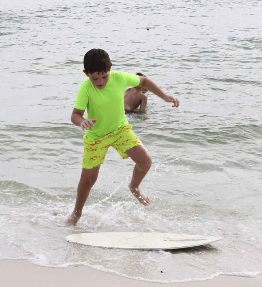 Families flock to ‘skim and surf’ event