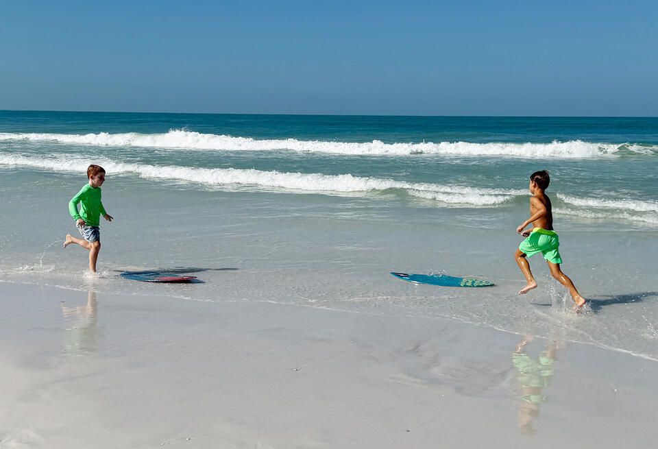 Center’s summer campers learn skimboarding