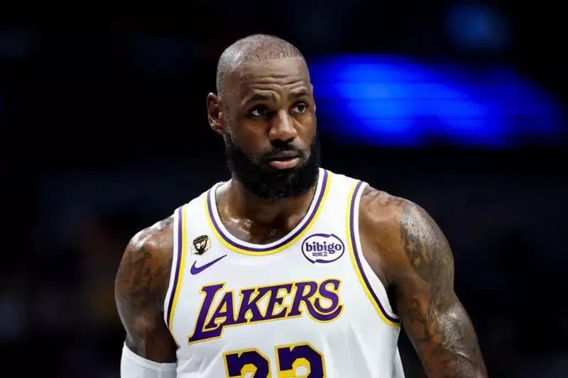 LeBron James Springs to Action After Stray Ball Hits Young Courtside ...