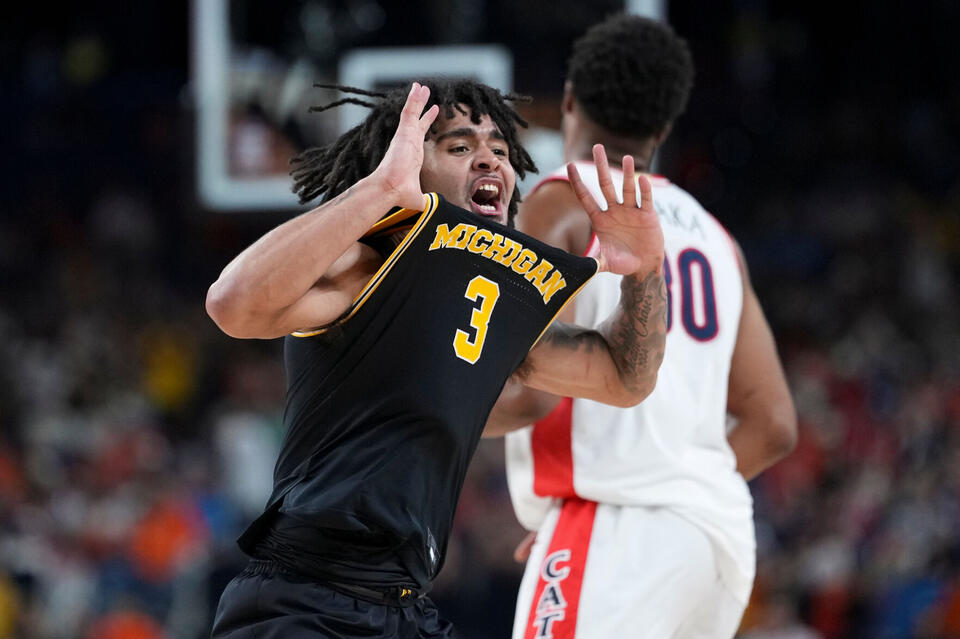 Michigan rolls to national title game with its latest double-digit ...