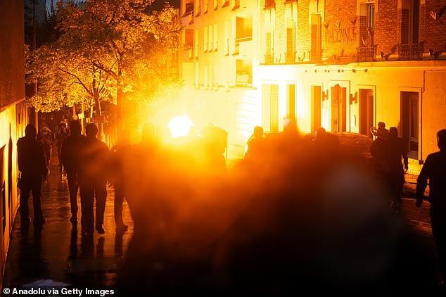 French riot police hit far-Left mobs with water cannon as protests continue for second weekend