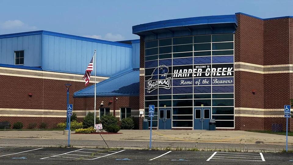 Harper Creek teacher resigns after charges filed for 'off-duty behavior