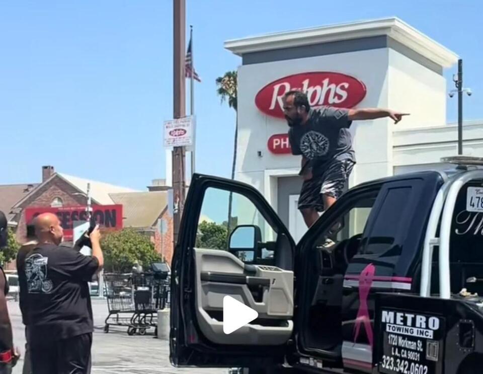 Man Climbs on Top of Tow Truck Outside Koreatown Ralphs in Wild Viral ...