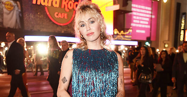 Miley Cyrus Stuns In Fringe Blue Dress At Gucci ‘Love Parade’ Show – NewsBreak
