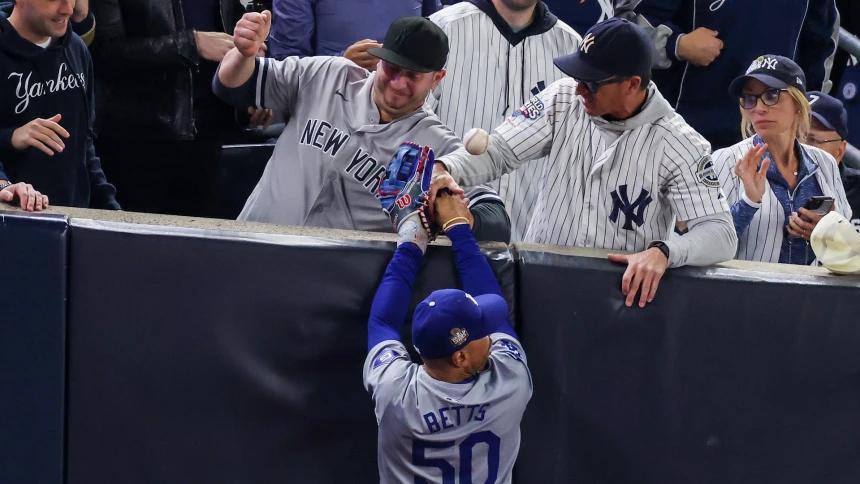 Yankees fan grabs Mookie Betts' glove trying to pry ball loose in World ...