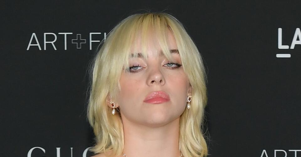 Billie Eilish Takes a Red Carpet Risk in Lacy Black Outfit and Sky-High Sandals at LACMA Gala – NewsBreak