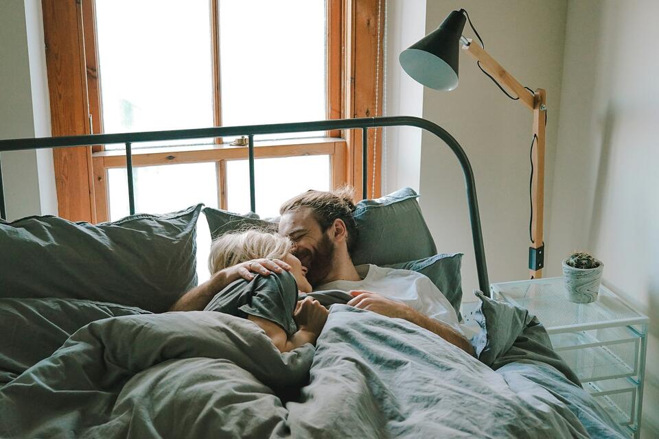 Wife Says Her Socks “Just Have to Be on the Foot,” So Her Helpful Husband Snaps the Second One Barely Two Inches Over Her Toes, Watches Her Jaw Drop, and Then Fixes It Properly Before Their Morning Kiss