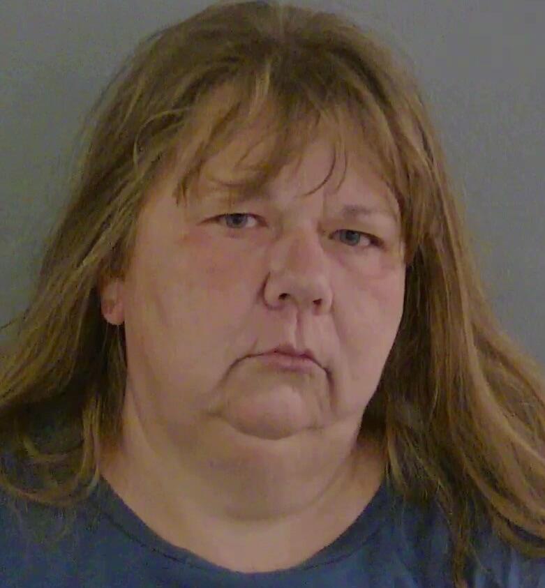 Woman tries to bite cop following her arrest in laundromat brawl ...