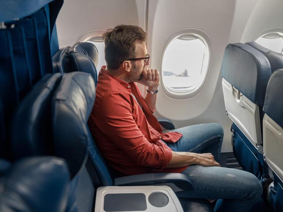 Would you ‘rawdog’ a flight? Bizarre travel trend sweeping TikTok explained