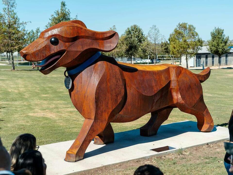 Giant wiener dog sculpture runs into Buda City Park - NewsBreak