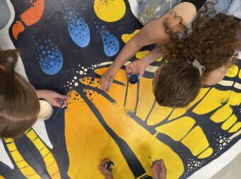 FRCC Students’ 90-Foot Butterfly Mural Brightening Up Downtown Longmont