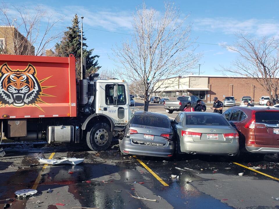 Pocatello garbage truck crashes into numerous cars in church parking