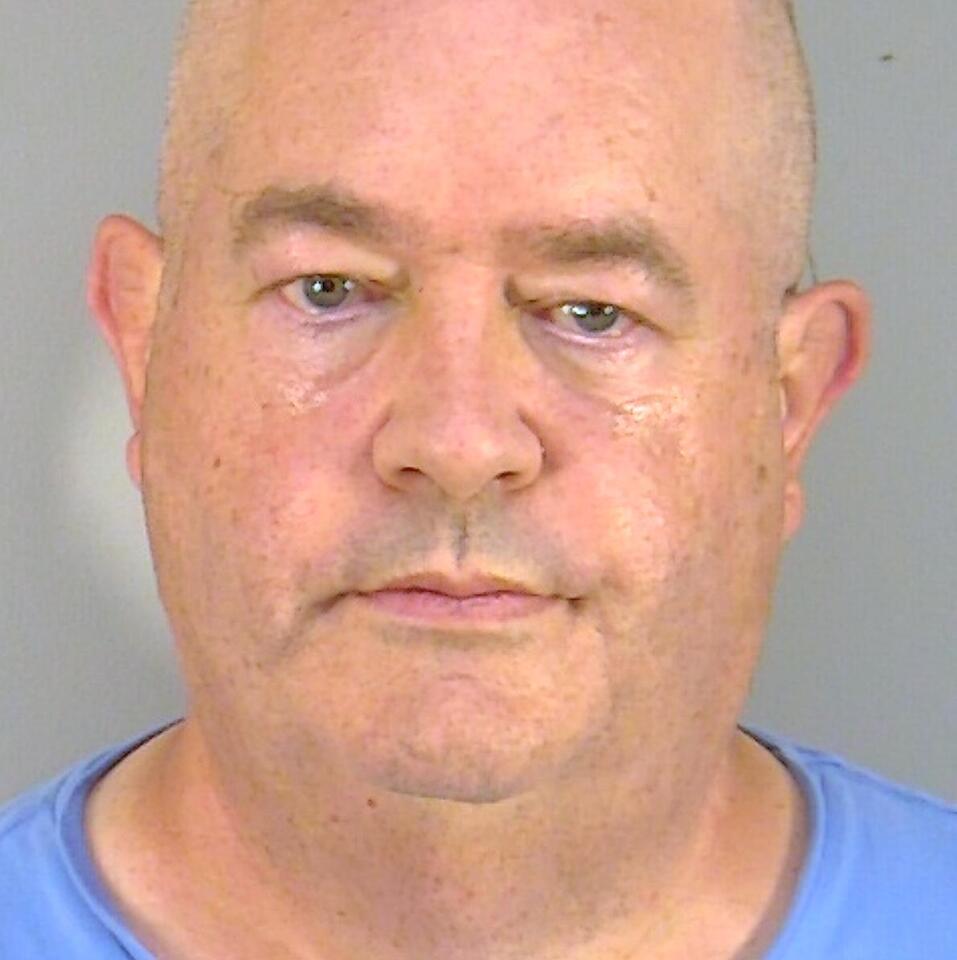 Man accused of pulling gun on neighbor fishing behind his house on ...