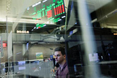 S&P 500 closes lower to end rocky week