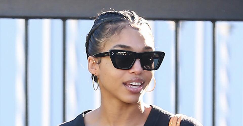Lori Harvey Makes the Case for Socks and Sandals with Sporty Leggings and a Button-Up Sweater – NewsBreak