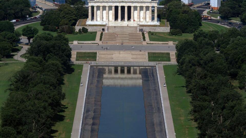 Reflecting Pool repairs near completion after dispute over cause of ...
